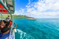 The Tourists take a photo at beautiful sea and sailing boats in Moorae Island at Tahiti PAPEETE, FRENCH POLYNESIA